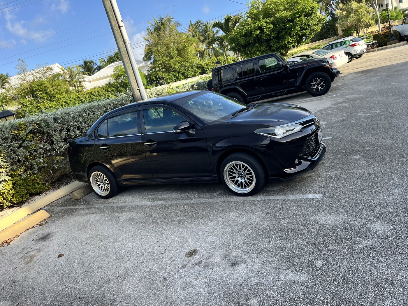 Toyota Corolla Axio – Black, Clean, Push-Start, Custom Rims - ecay